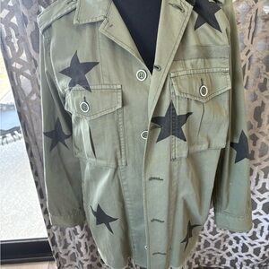 Green Jacket with Black Star Pattern